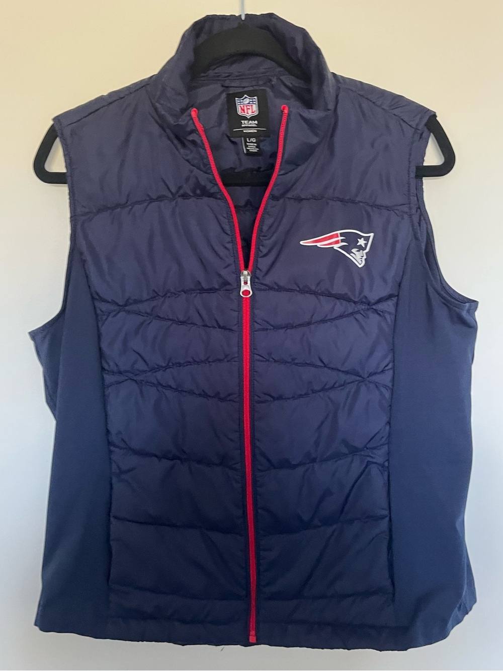 NFL Women's Navy Quilted Vest with Red Trim and Team Logo